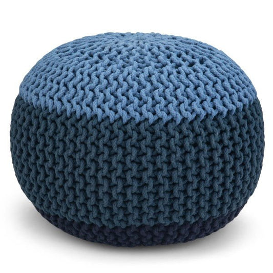 The Nikki Handcrafted Hand Knit Round Pouf features a round shape with a chunky knitted texture, showcasing a light blue top and a darker blue body.