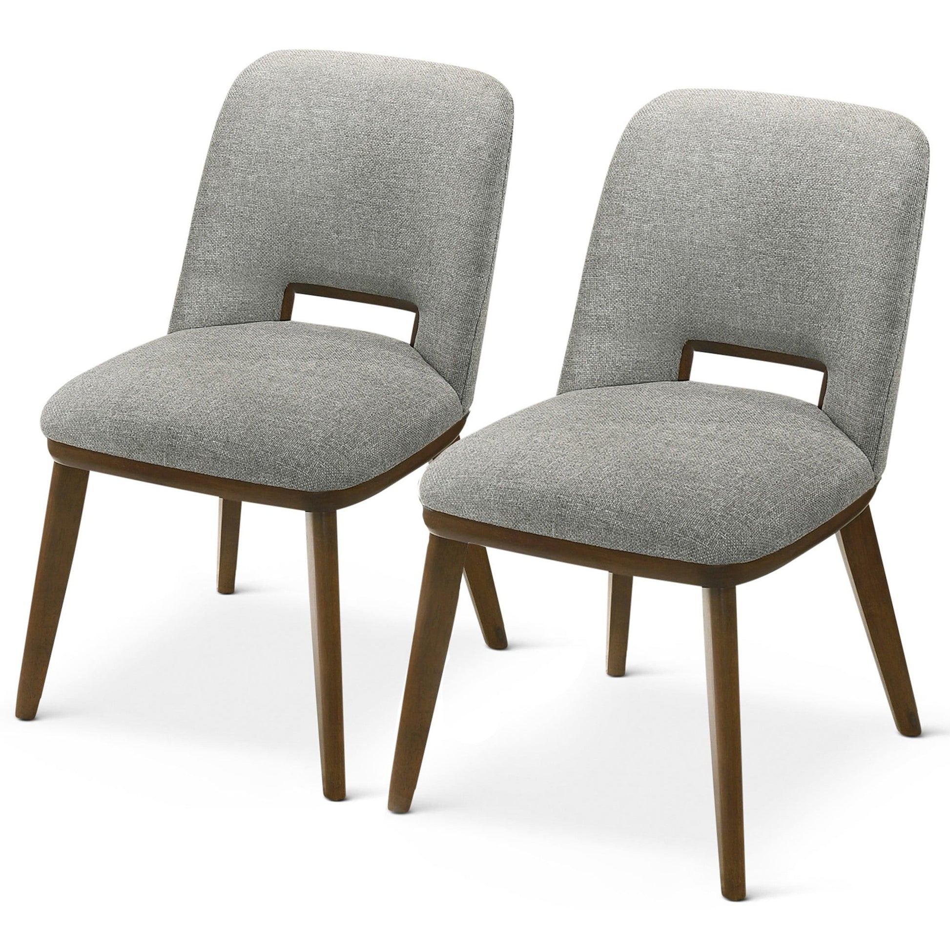 The Blake - Modern Dining Chair (Set of 2) features light gray upholstered seats and backs, wooden frames with tapered legs, and a rectangular cutout in each lower backrest for a modern touch.