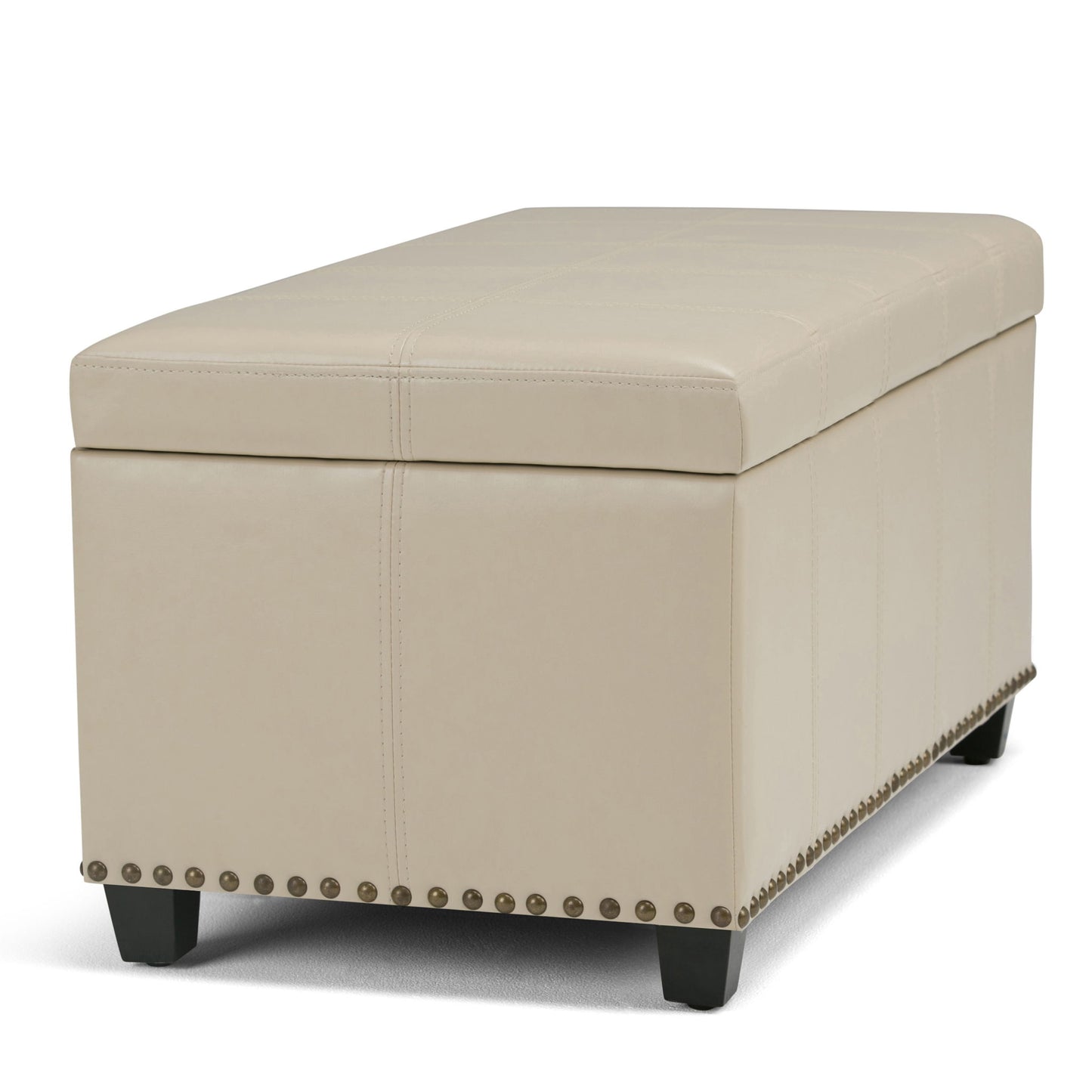 The Amelia Transitional Storage Ottoman Bench features a rectangular beige upholstered design, cushioned top, decorative stitching, nailhead trim along the base, and short black legs.