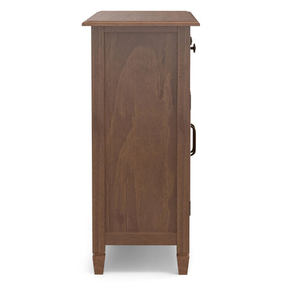 Side view of the Connaught Entryway Storage Cabinet in Medium Saddle Brown, featuring a paneled side, simple legs, and metal handles on the front.