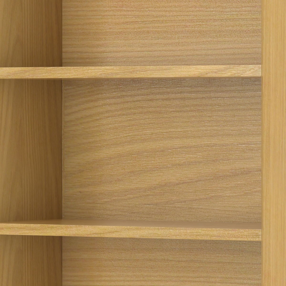 Close-up view of the Banting - Mid Century Handcrafted Bookcase, featuring three empty horizontal shelves and a light wood grain finish.