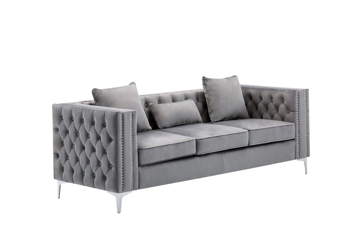 The Lorreto - Velvet Fabric Living Room Set features a modern gray velvet sofa with tufted back and sides, three seat cushions, two square pillows, one rectangular pillow, and metal legs—all shown against a white background.