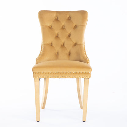 The Nikki chair is a modern, high-end dining chair featuring tufted velvet upholstery, golden stainless steel-plated legs, and nailhead trim—shown here in a set of two against a plain white background.