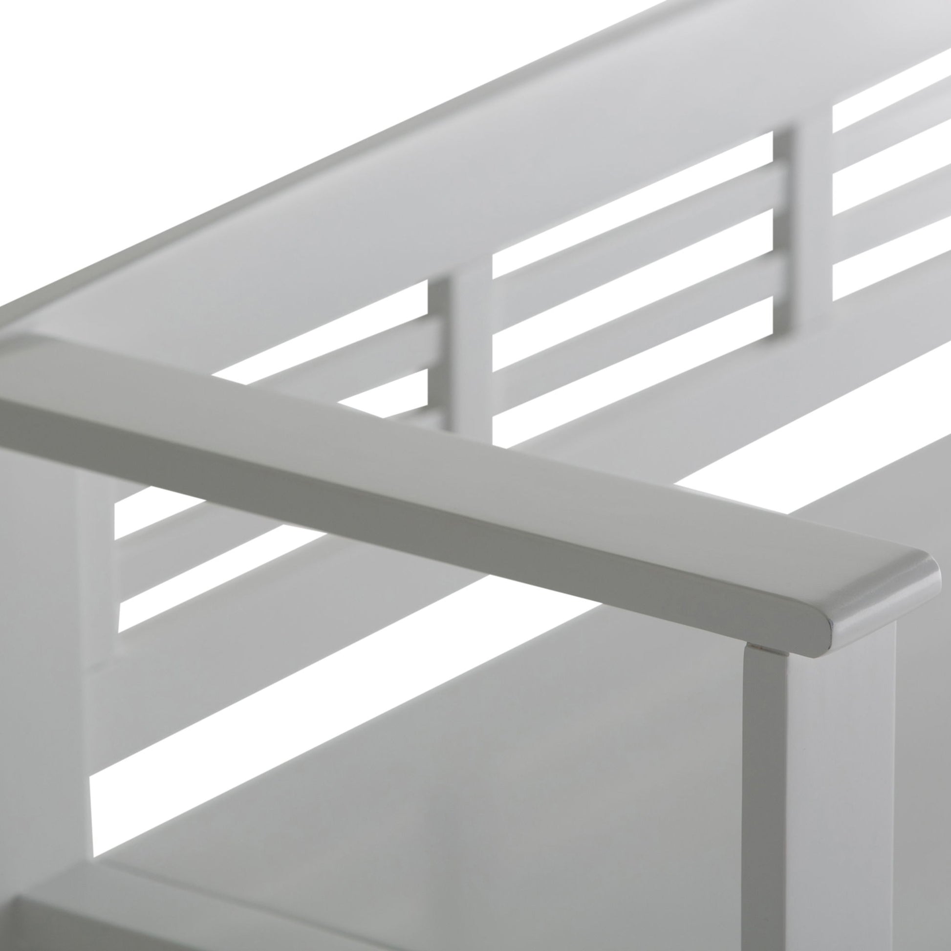 Close-up of the Adams - Entryway Storage Bench Handcrafted, featuring a white wooden frame with a slatted backrest, straight armrest, and clean lines for a sleek, modern look.
