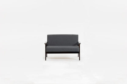 The Bahamas - Loveseat, featuring a modern design in dark gray with wooden arms and legs, sits centered against a plain white background.