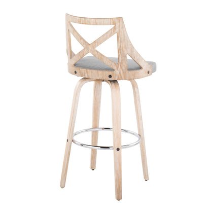 The Charlotte Farmhouse Fixed Height Bar Stool (Set of 2) features a light wood finish, curved backrest with open X-pattern, padded gray seat, swivel function, four angled legs, and a round metal footrest.