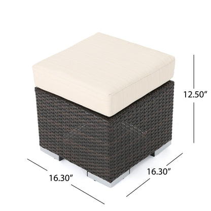 The Santa Rosa Outdoor Lounge Ottoman features a square design with a dark brown wicker base, cream cushion, and measures 16.30"W x 16.30"D x 12.50"H—perfect for outdoor spaces.