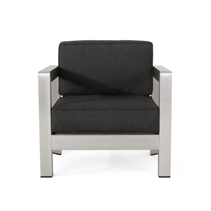 The Aviara - Luxurious Outdoor Club Chair features a matte silver metal frame with dark gray cushioned seat and backrest, displayed front-facing against a white background.
