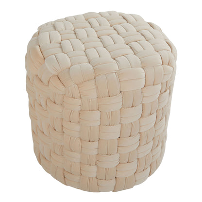 The Braided - Versatile Round Ottoman features a chunky, woven beige fabric design that covers the entire surface, giving it a cozy, modern look with soft texture and contemporary appeal.