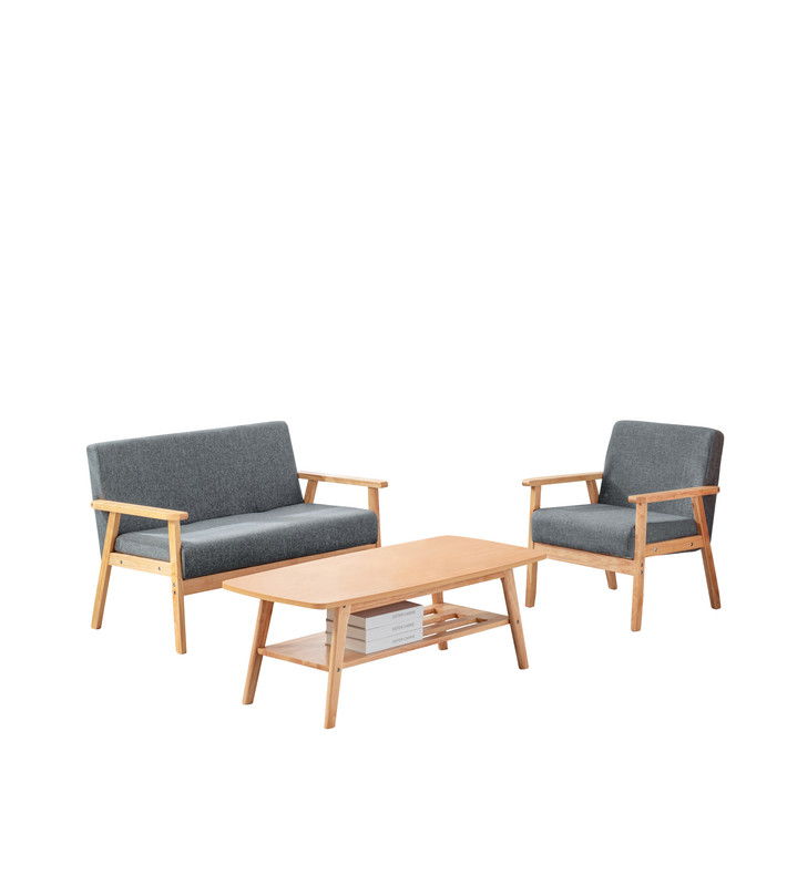The Bahamas Living Room Set includes a modern light wood frame, a gray two-seater sofa, matching armchair, and a rectangular coffee table with books on the lower shelf, all set against a white background.
