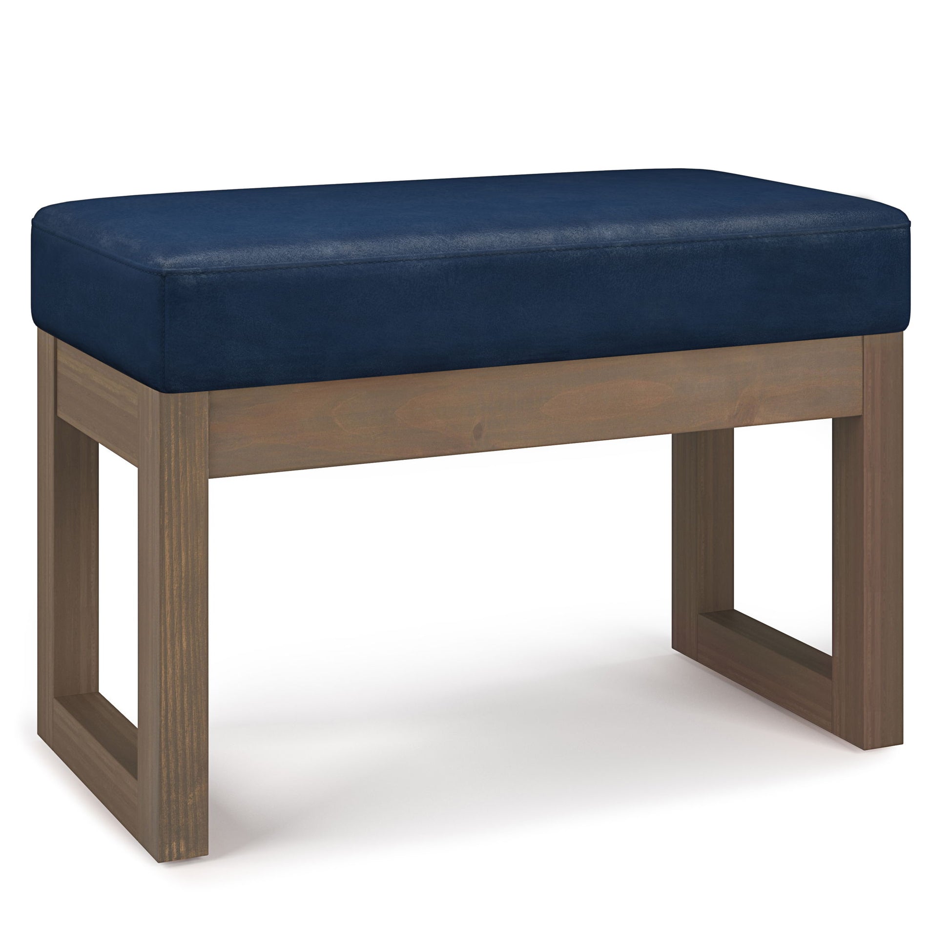 The Milltown - Upholstered Ottoman Bench features a navy blue cushioned rectangular seat and a wooden base with open rectangular legs, offering a modern, minimalistic design.