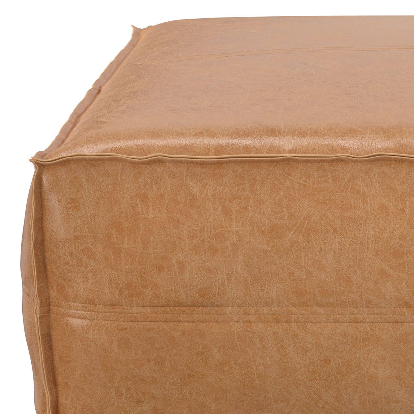 Close-up of the corner of the Brody Large Square Coffee Table Pouf, featuring tan faux leather upholstery with visible stitching and a textured surface.