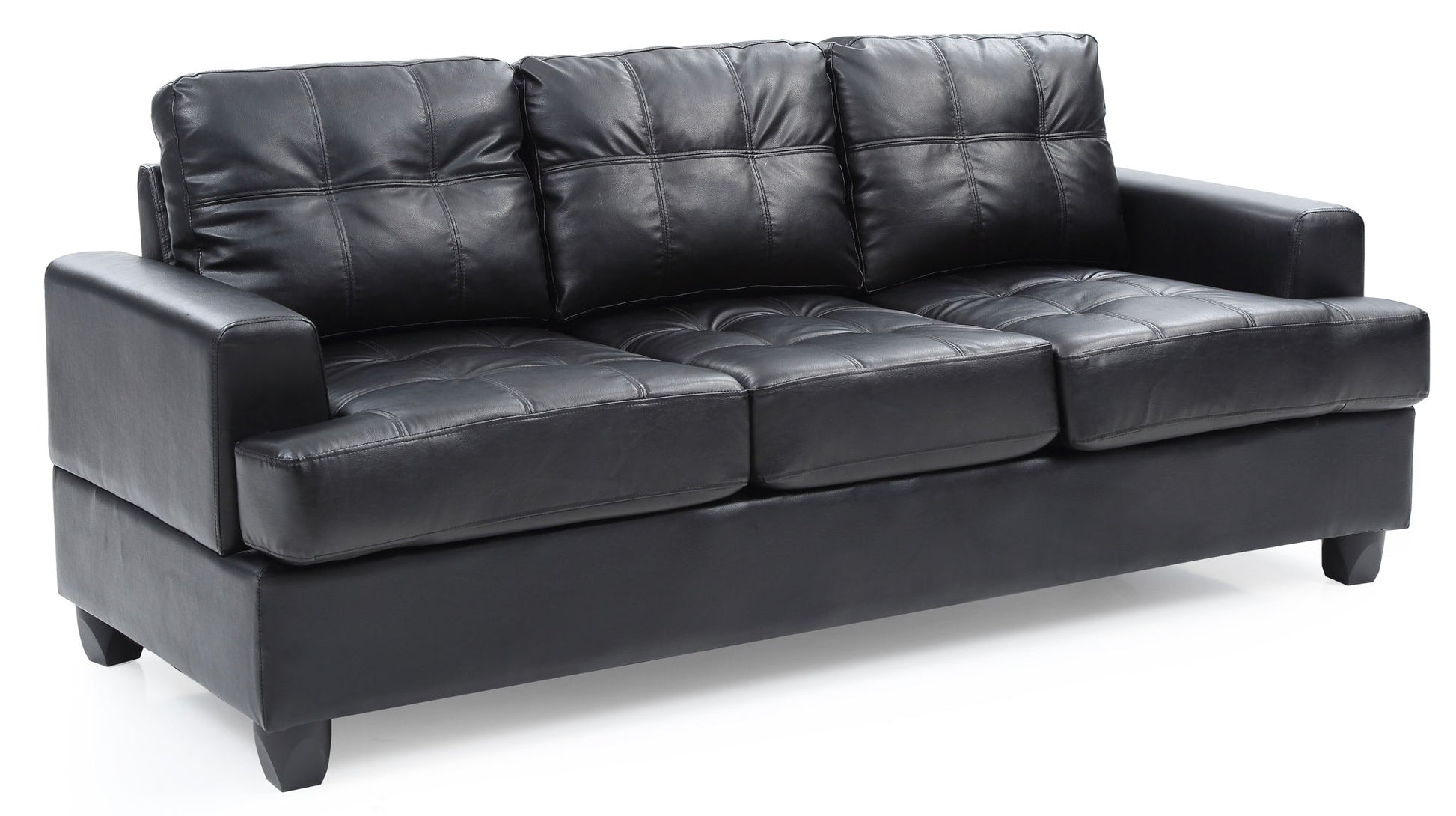 The Sandridge Sofa is a black leather piece with three seat and back cushions, visible tufted stitching, straight armrests, and short legs.