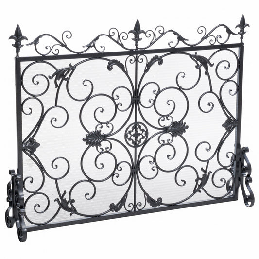 The Darcie - Wrought Fireplace Screen features an ornate black design with scrollwork, floral motifs, and finial accents; it stands upright on curved feet for stability.