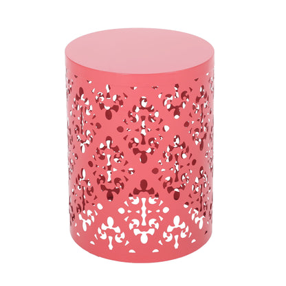 The Outdoor Metal Modern Design End Table features a round, pink metal build with a decorative cut-out cylindrical base and a smooth, solid top.