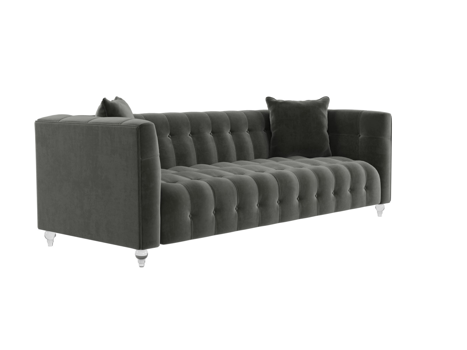 The Bea Velvet Tufted Sofa in dark green comes with two matching cushions and is supported by clear legs. This sofa boasts a modern design with a high back and armrests, offering a plush and elegant appearance.