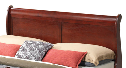 A Panel Sleigh Bed features a dark wooden headboard behind beige pillows, accented by gray, pink, and floral-patterned throw pillows.