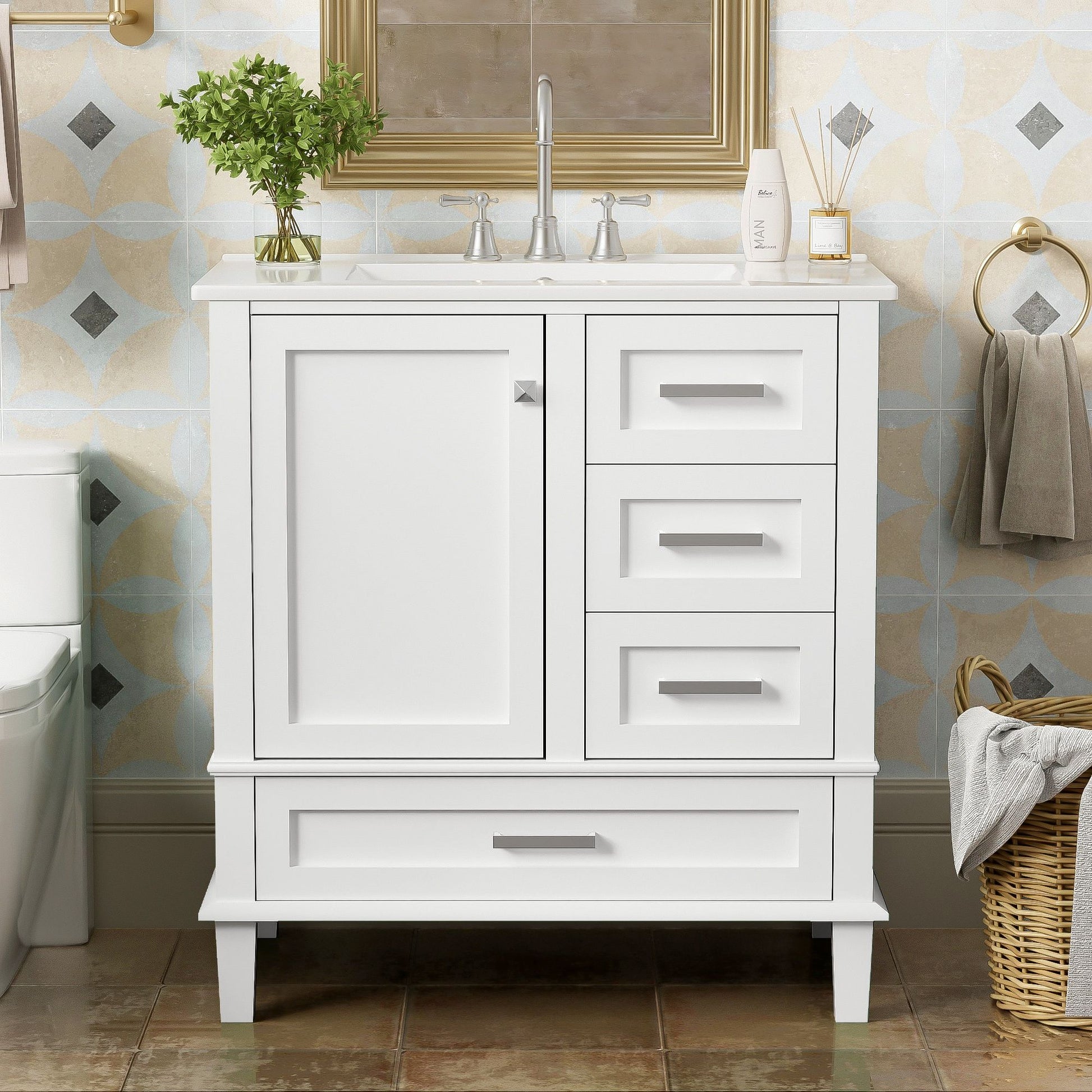 A modern bathroom vanity with sink combo set features a solid wood frame, soft closing door, and 3 drawers. Nearby are a gold-framed mirror, soap, towel, wicker basket; a plant sits on the vanity.