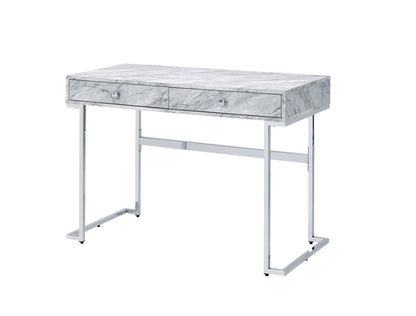 The Tigress Printed Faux Marble Top Writing Desk in white features a rectangular faux marble surface, two front drawers with square knobs, and chrome-finished metal legs set against a white background.