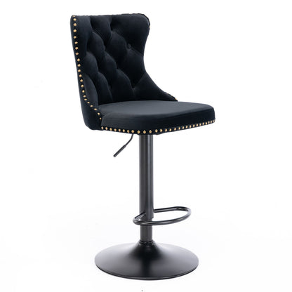 The Swivel Velvet Barstools (Set of 2) feature a modern black tufted back, gold stud accents, cushioned seat, circular footrest, and a round pedestal base. Adjustable seat height makes them ideal for home pubs and kitchen islands.