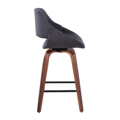 The Fabrico Mid-Century Modern Counter Stool (Set of 2) features a curved dark gray upholstered seat, walnut-finished wooden legs, and a black metal footrest, displayed in profile against a white background.