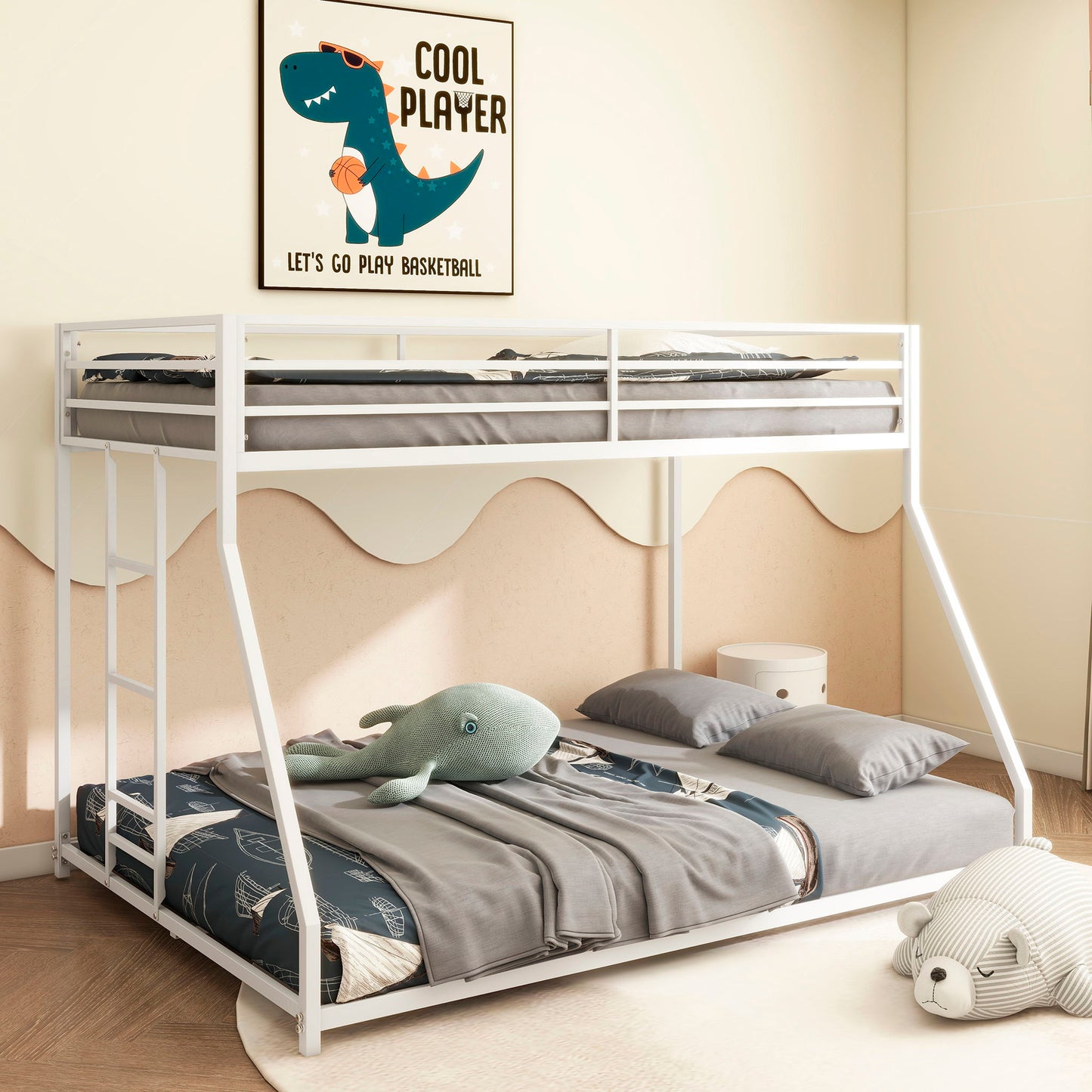 A tidy kids’ room features the Adam Metal Bunk Bed in white with gray bedding, a plush shark on the lower bunk, a teddy bear rug on the floor, and a playful dinosaur basketball poster on the wall.
