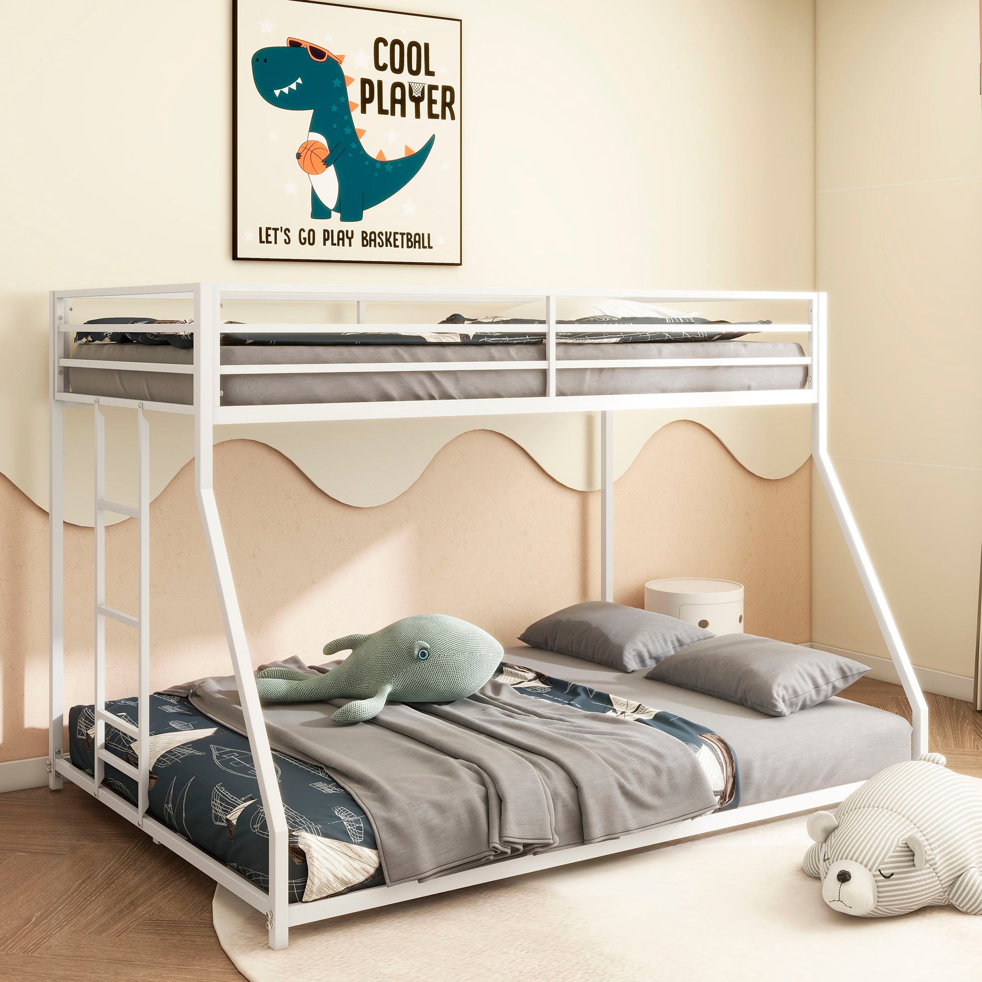 A tidy kids’ room features the Adam Metal Bunk Bed in white with gray bedding, a plush shark on the lower bunk, a teddy bear rug on the floor, and a playful dinosaur basketball poster on the wall.