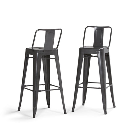 A set of two Rayne Curved Back Metal Stools featuring tall, industrial-style black metal frames with backrests and footrests, shown on a white background.
