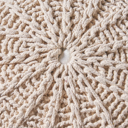 Close-up of the Bordeaux - Knitted Cotton Round Pouf Ottoman and Floor Cushion, featuring a cream-colored, circular crochet pattern with a white fabric center and radiating textured loops and knots.