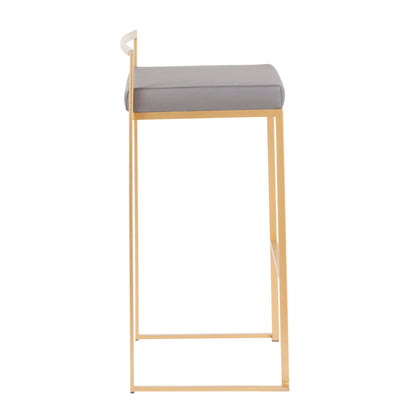 Side view of the Fuji barstool, featuring a gold metal frame and a square, light gray cushioned seat. Its minimalist design includes a thin backrest bar that curves slightly at the top for contemporary glam style.