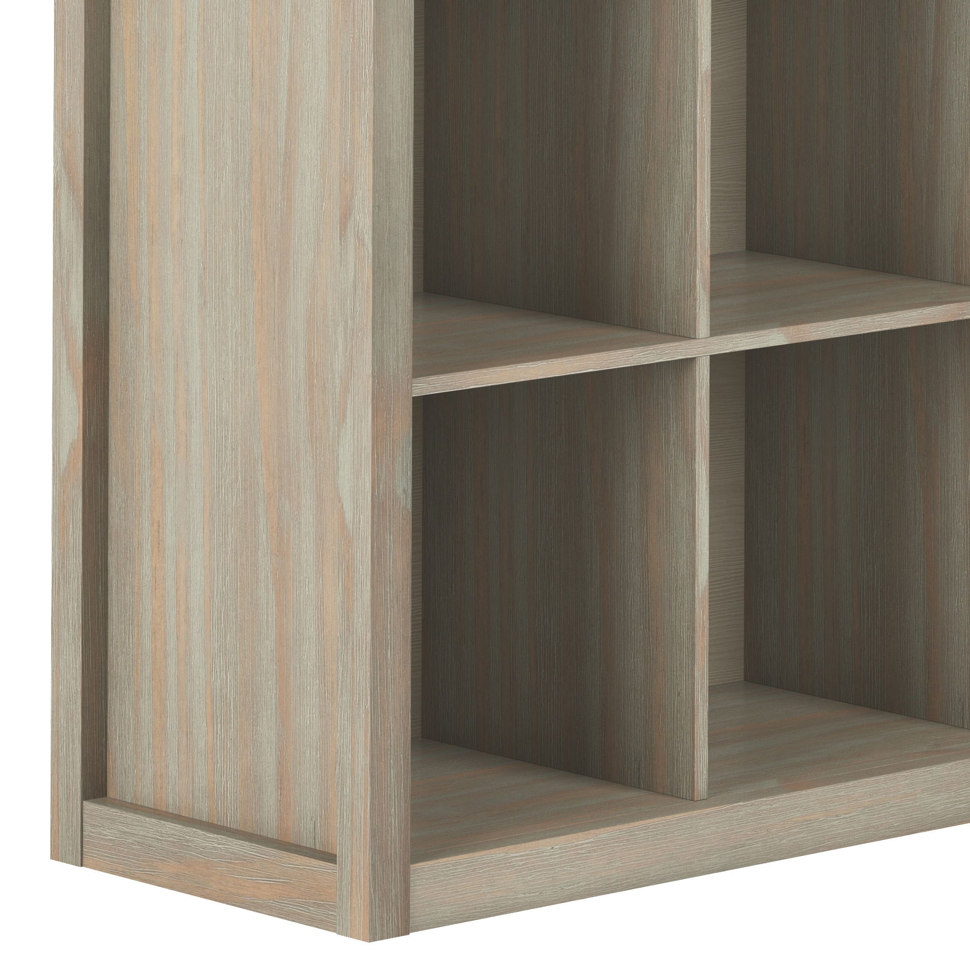 Close-up side and partial front view of the Artisan - Cube Storage, a light brown wooden shelf with a grid design featuring four square compartments.