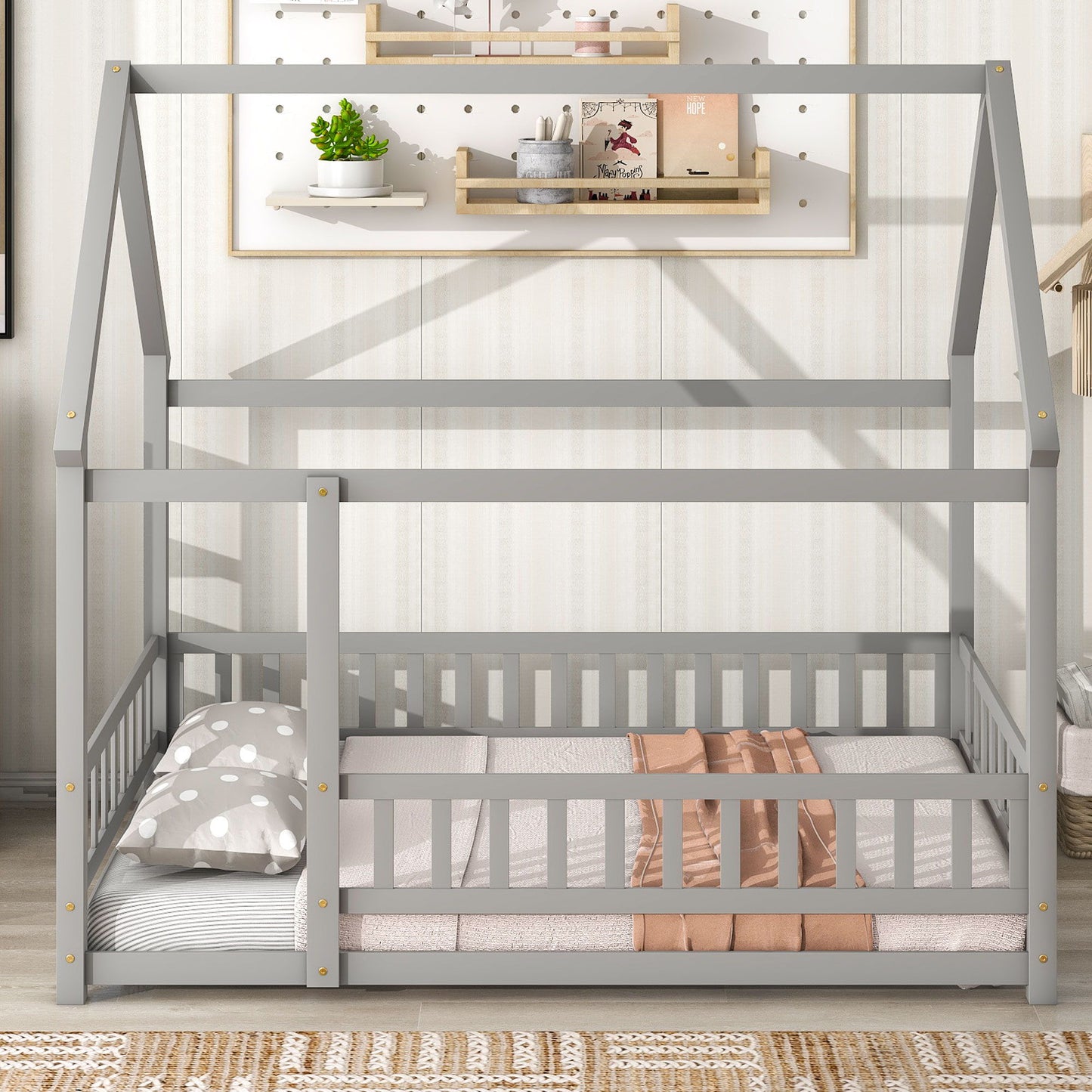 A grey Floor Wooden Bed with a house roof frame and fence guardrails.