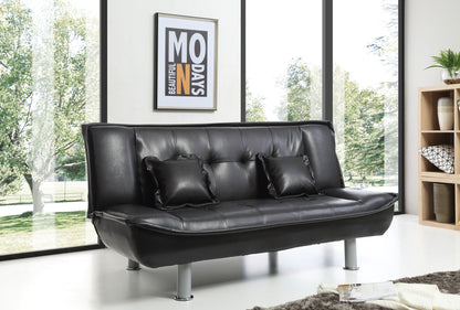A modern room with large windows showcases the Lionel - Sofa Bed in black leather with two matching pillows. Framed wall art hangs behind, a decorated bookshelf sits right, and sunlight brightens the stylish space.