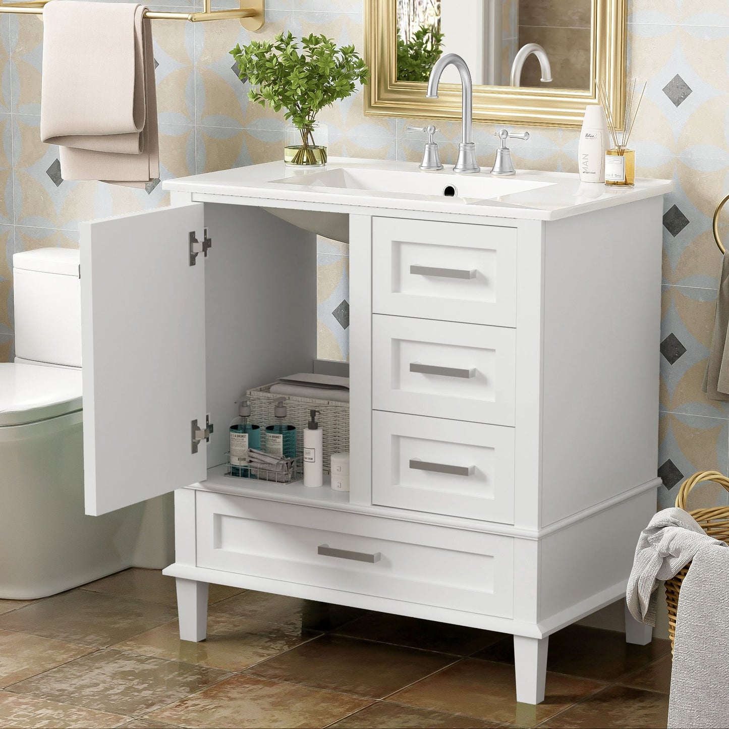 A modern bathroom vanity with a solid wood frame features a sink, chrome faucet, plant on top, soft closing door open to reveal organized toiletries, and 3 drawers. A mirror and towel are visible in the background.