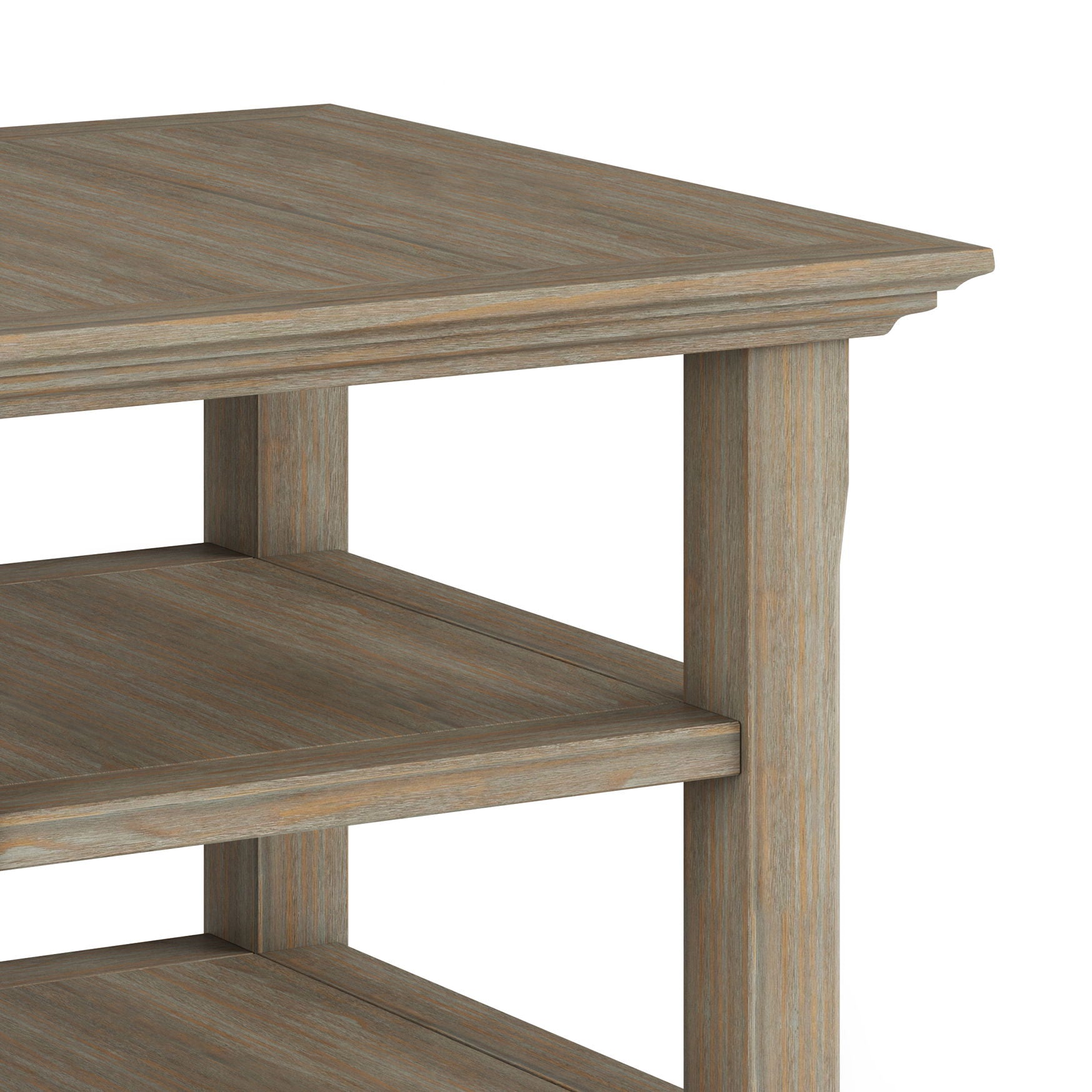 Close-up of the Acadian - Handcrafted End Table corner, showing its two shelves, light brown weathered finish, and sturdy legs.
