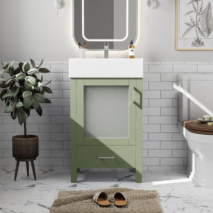 A small bathroom features the Bathroom Vanity With Ceramic Sink And Ample Storage, a round mirror, potted plant, white subway tiles, toilet, framed botanical print, marble floor, and brown slippers on a textured mat.