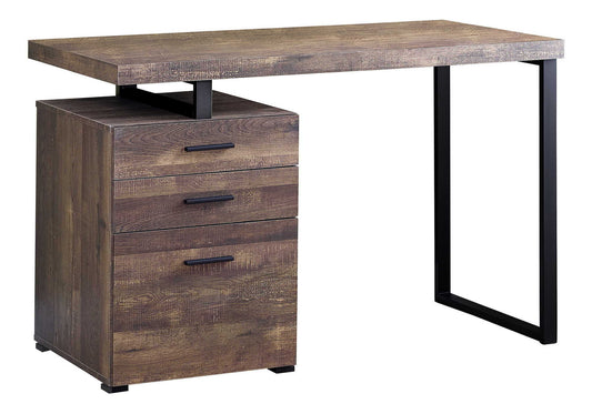 The Computer Desk For Home Office features a rectangular top, black metal legs on one side, and three stacked storage drawers with black handles on the left. The wood has a rustic, weathered finish for a modern look. Left or right set-up available.