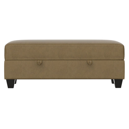 The Drason Storage Ottoman is rectangular, light brown with a smooth upholstered surface, short black legs, and two small pull handles on the front panel.
