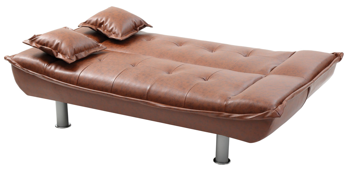 The Lionel - Sofa Bed is a brown leather futon with two matching pillows, a tufted design, and four silver metal legs, shown isolated on a white background.