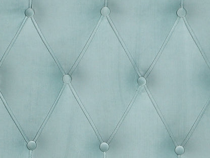 Close-up of the Luma Upholstered Bed's light blue tufted fabric, featuring diamond-shaped stitching and buttons at each intersection for a quilted, padded texture.