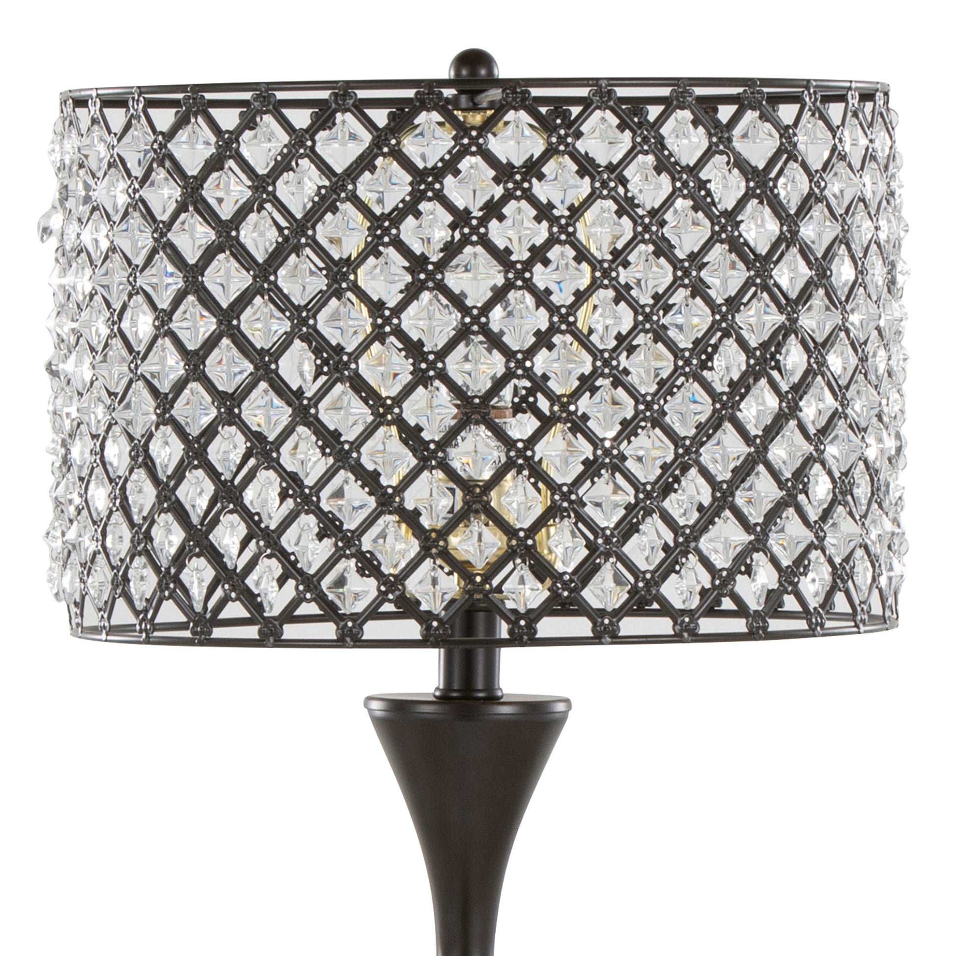 A close-up of the Topaz - Contemporary Table Lamp, featuring a black metal base and a cylindrical lattice-patterned shade adorned with clear crystal-like accents.