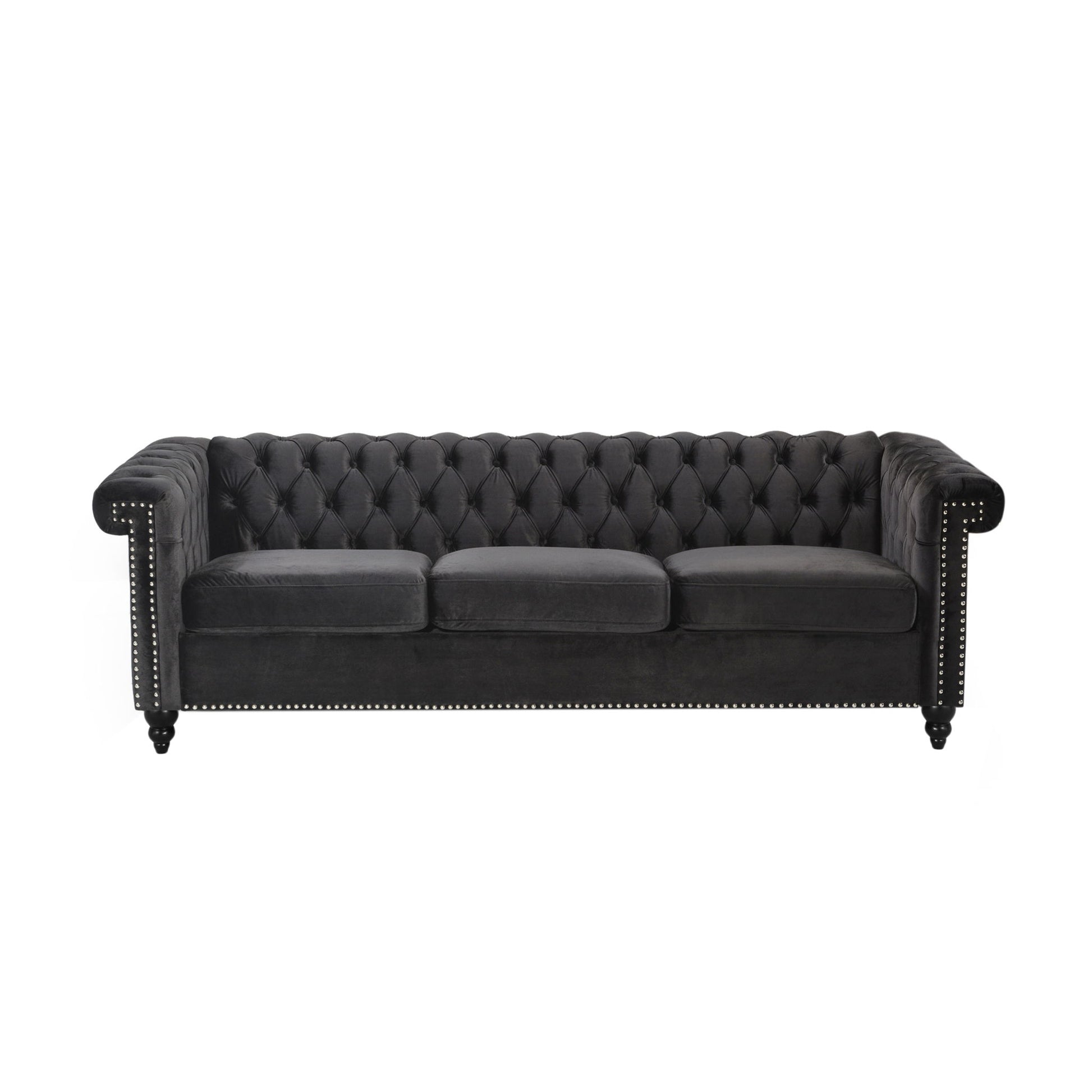 The Chesterfield Style 3 Seater Sofa features deep button tufting, black velvet upholstery, three seat cushions, nailhead trim on the arms and base, rolled arms, and dark wooden legs.