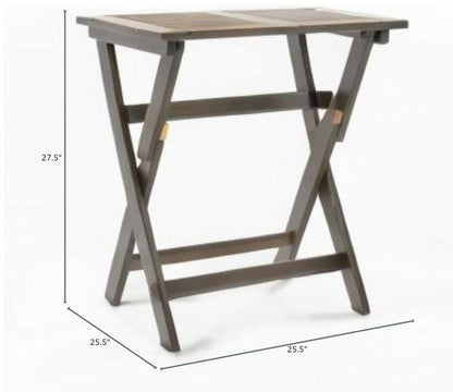 The Positano - Foldable Dining Set features a small, rectangular wooden table with crossed legs, slatted top, and side bars. Dimensions: 27.5" H x 25.5" W x 25.5" D.