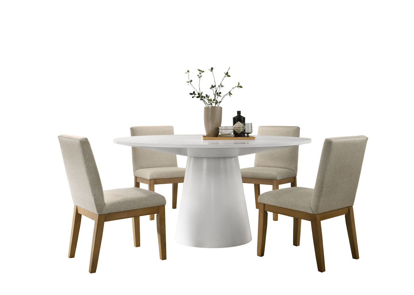 The Jasper Wide Contemporary Round Dining Table Set features a modern white table and four beige upholstered chairs with wooden legs, accented by a vase with branches and two small decorative objects on the tabletop.