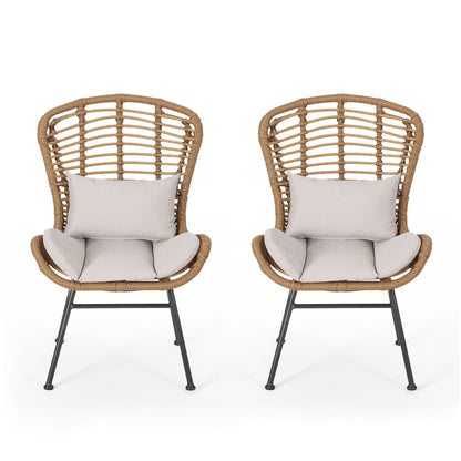 Two Calypso outdoor chairs with water-resistant cushions and iron frames, featuring high curved backs and light gray seats, displayed side by side against a white background.