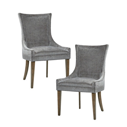 A set of two Ultra - Elegant Dining Side Chairs with gray upholstery, high backs, and wooden legs are displayed on a white background—one angled, the other facing forward.