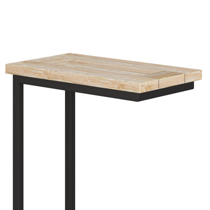 The Skyler - C Side Handcrafted Table features a rectangular light wood top and a black metal C-shaped frame, designed to slide easily under your sofa or chair.