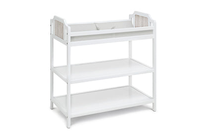 The Brees Changing Table is a white wooden unit with raised sides, a padded top, two open storage shelves below, and back panels featuring a light wood accent.