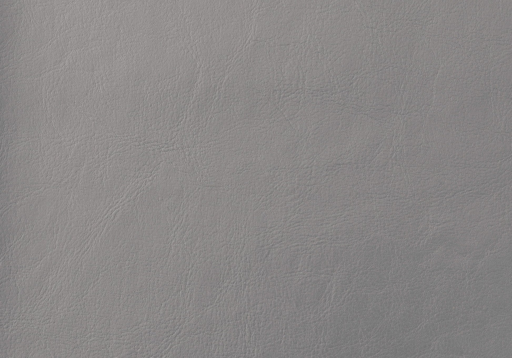Close-up of the Queen Size Gray Upholstered Bed Headboard showcases its smooth, light grey leather texture with subtle creases and natural grain patterns, highlighting its durable transitional construction.