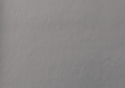 Close-up of the Queen Size Gray Upholstered Bed Headboard showcases its smooth, light grey leather texture with subtle creases and natural grain patterns, highlighting its durable transitional construction.